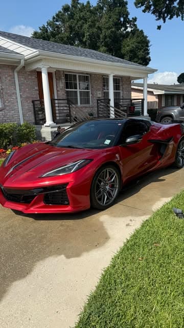 Red C8 Corvette kept clean on a maintenance schedule by MJ's Mobile Detailing