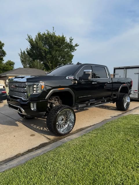 Lifted black GMC Sierra detailed on location by MJ's Mobile Detailing